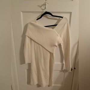 A long sleeve asymmetrical knit dress